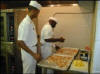 Cooks training in a garrison dining facility